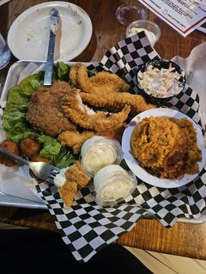 Crab cake and catfish combo!  The red rice tastes like Jollof!   #Africanisms!!