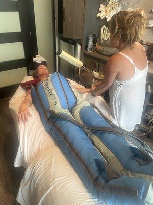 This is a doing the BIG SQUEEZE. A great way to maximize your time. Get a Lymphatic massage while getting a facial.