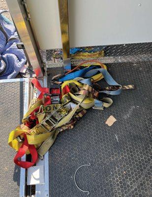 heres the stack of tie downs that were provided to the movers. They used none of them and just left them in the corner.