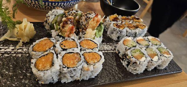 Top: Shrimp tempura maki, sweet potato  Bottom: Spicy salmon maki, Philadelphia roll (smoked salmon, cucumber, cream cheese)