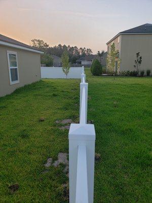 It's "mostly" straight... I guess.  See debris on both sides of fence.