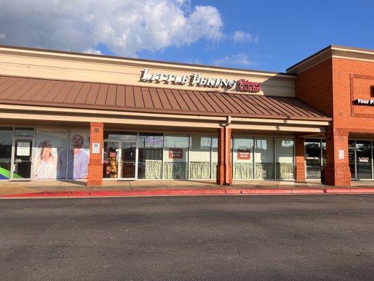 Exterior view of Little Peking in the Dawson Village Shopping Center