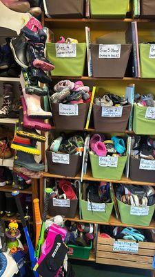 All children's shoes and sandals well organized by numbers.