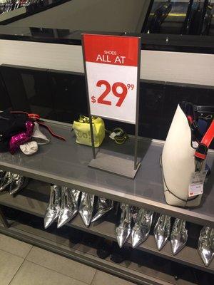 Sale sign the manager did not want to honor. when it's clearly for the shoes on the shelf.