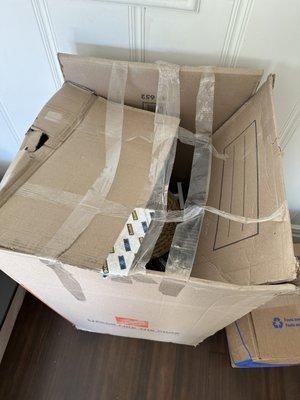 This is how my wardrobe boxes arrived... opened and smashed.