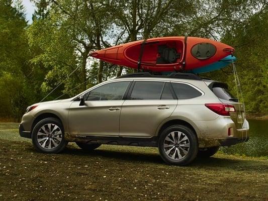 Subaru Outback wagon hauling kayak in Greeley CO