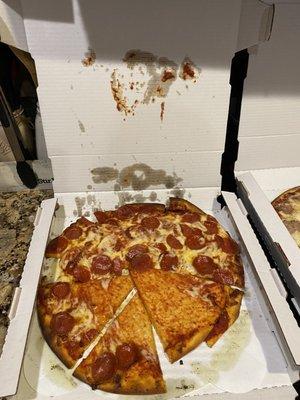 Pizza that may have been dropped was also missing one of the toppings we ordered.