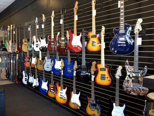 Wide variety of guitars including Epiphone, Squier, D'Angelico, Silvertone, Ibanez, Lyman, and more