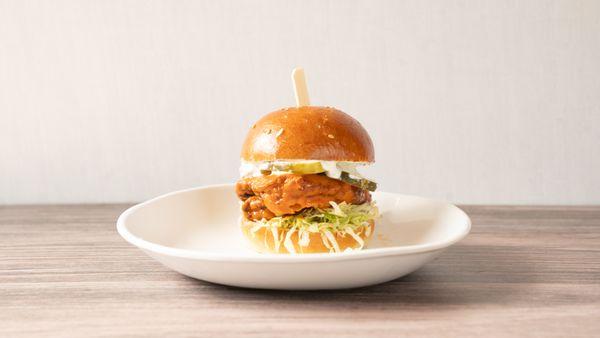 The Buffalo Chicken Sandwich: spicy buffalo sauce / pickles / lettuce / tomato / ranch