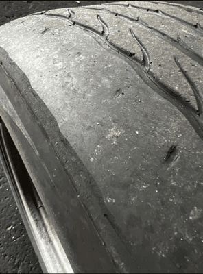 very warned down tire driver side