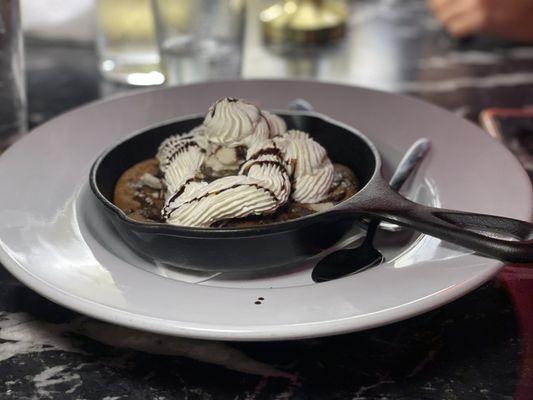 Vegan cookie skillet topped with ice cream. (Yeah I said vegan)