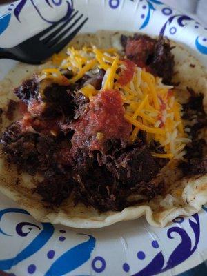 Barbacoa taco. Came home and added shredded cheese. So good and so much filling! More like a lunch item than breakfast lols