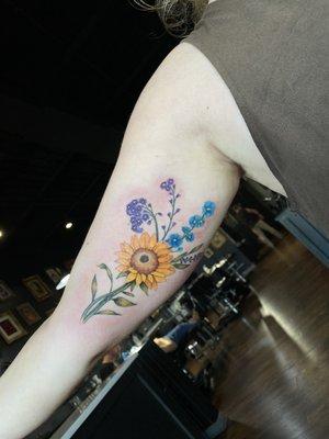 Color realism flower tattoo by Scott McClanahan