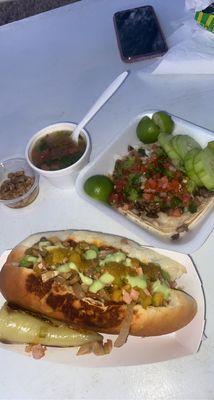 Sonoran dog and taco de Carne asada