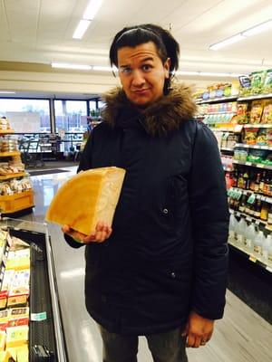 Here's the hubby with $200 worth of parmesan reggiano.