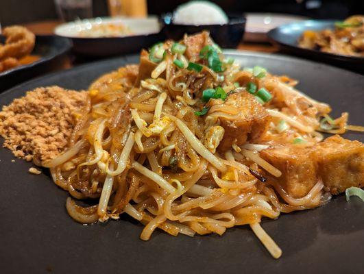 N1. Pad Thai with Tofu. $15. Pan-fried rice noodles, eggs, bean sprouts, scallions, ground peanuts with "Bk54 Seasonings."