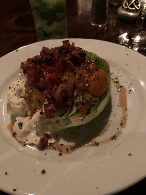 Iceberg wedge with crumbled bacon and blue cheese