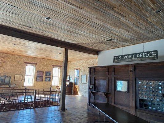 Upstairs event room with historical photographs