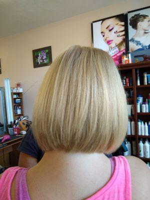 Elegant modified bob cut from very long hair