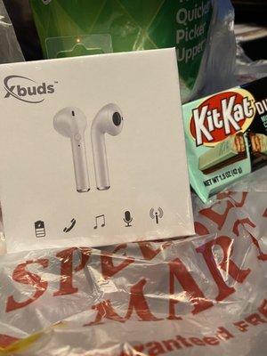 Wireless ear buds, KitKat and paper towel.