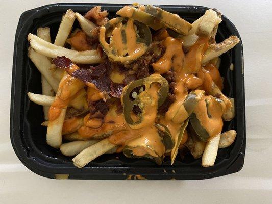 My weak moment of the day... Bacon Jalapeño Cheese Fries $3.59. (4/14/20)