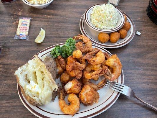 Shrimp ,scallops, baked potato and coleslaw