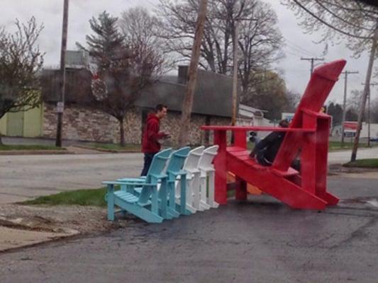 Customers love posing for photos in our "slightly" over-sized Adirondack chair!