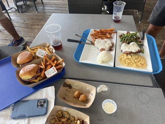 Our food. Burgers on potato buns, chicken fries chicken and chicken fried steak, along with ice cold sides