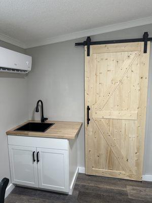 Barn door and kitchen sink