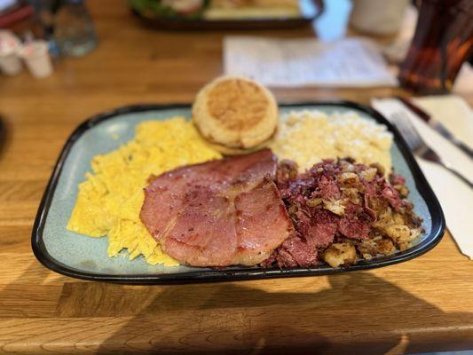 Eggs, country ham, corn beef hash, grits and English muffin