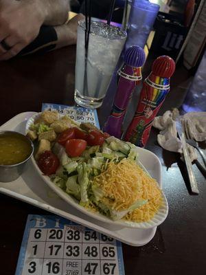 Side salad and a Tito's and lemonade