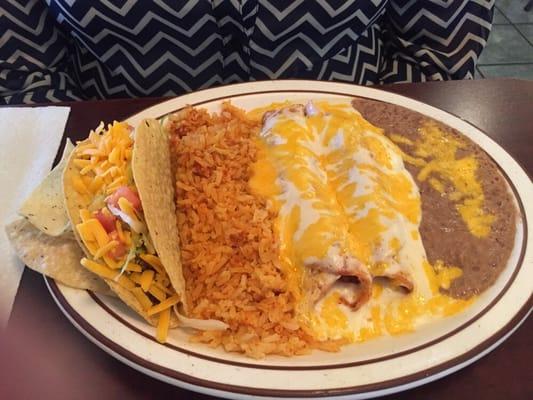 Number 5 chicken enchiladas and beef tacos