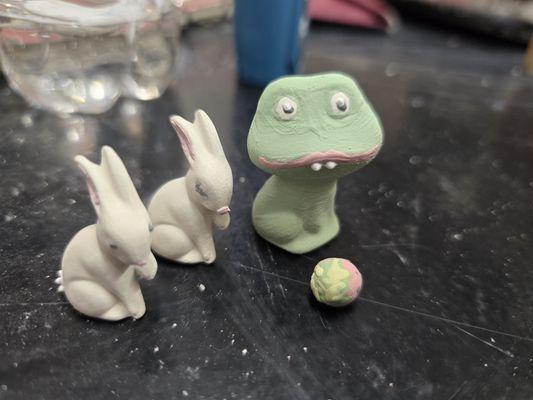 Close uo of the bunnies, frog and strawberry.