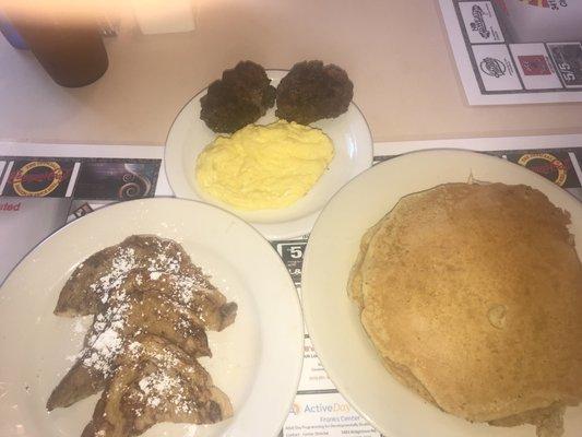 French toast/pancakes eggs and sausage patties