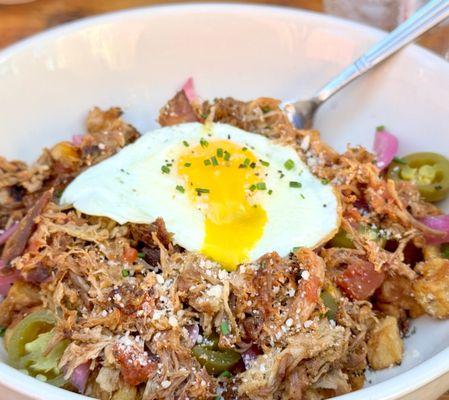 hash bowl topped with pork carnitas- added a side of green chili & sausage gravy