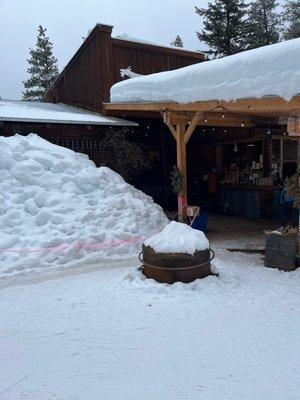 Quite a wall of snow alongside the store