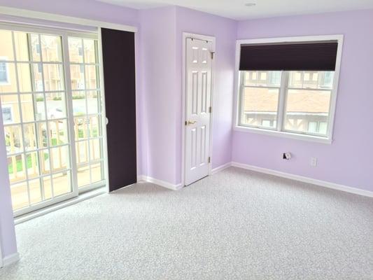 Blackout vertical/horizontal honeycomb shades and installed Milliken carpet.