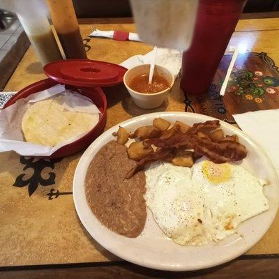 I hadn't been here in a while and I was in the mood for a breakfast plate. It was about $8 before tax and tip. See my photo of specials!