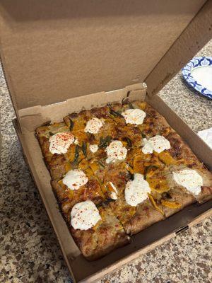 Veggie pizza: Onion Cream, Sage, Roasted honey Nut Squash, Goat Cheese & Chili Flakes.