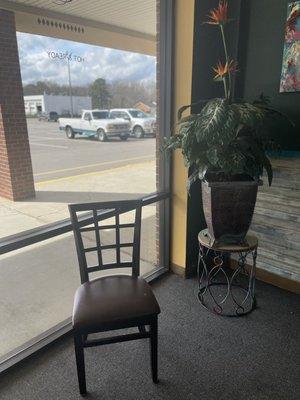 Lone seat to wait for your takeout order