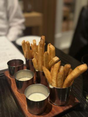 Pastrami fries, garlic herb fries, and dill fries with sauce pairings