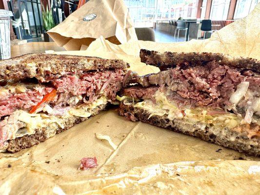 Pastrami with swiss, cole slaw, deli mustard on toasted marble rye.