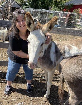 Teresa St. Frances communicating with a new friend at the Barn