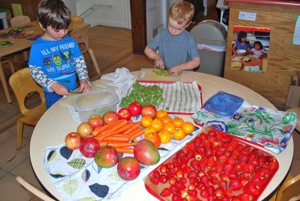 Everyday we work together to make our schools organic vegetarian snack.