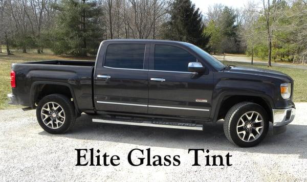 Our Color Stable Carbon window film nicely matches factory tint.