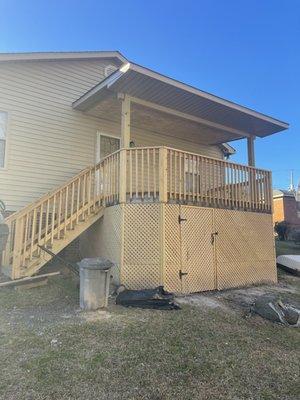 Added a roof and resurfaced the deck, add privacy lattice underneath with access door.