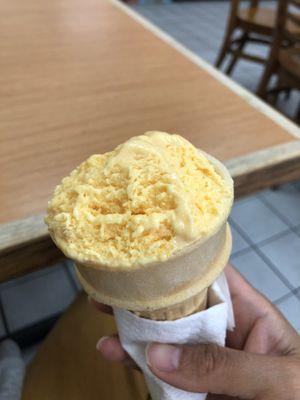 03/03/23 Sorry, ate half of my mango ice cream already.  1 small scoop, $2.99, with cone, $3+, waffle cone +$0.99.  It is yummy.