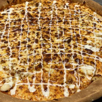 Buffalo Chicken Pizza | Hot Sauce Base | Chicken | Mozzarella & Cheddar Cheese | Ranch Drizzle