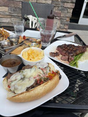 Roast Beast with au jus + mac n cheese and the Buffalo Ribeye with asparagus and mashed potatoes