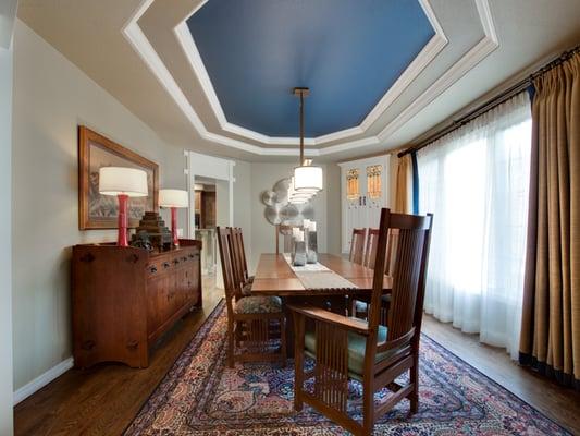 Dining room remodel with custom window treatments and new lighting and accessories.